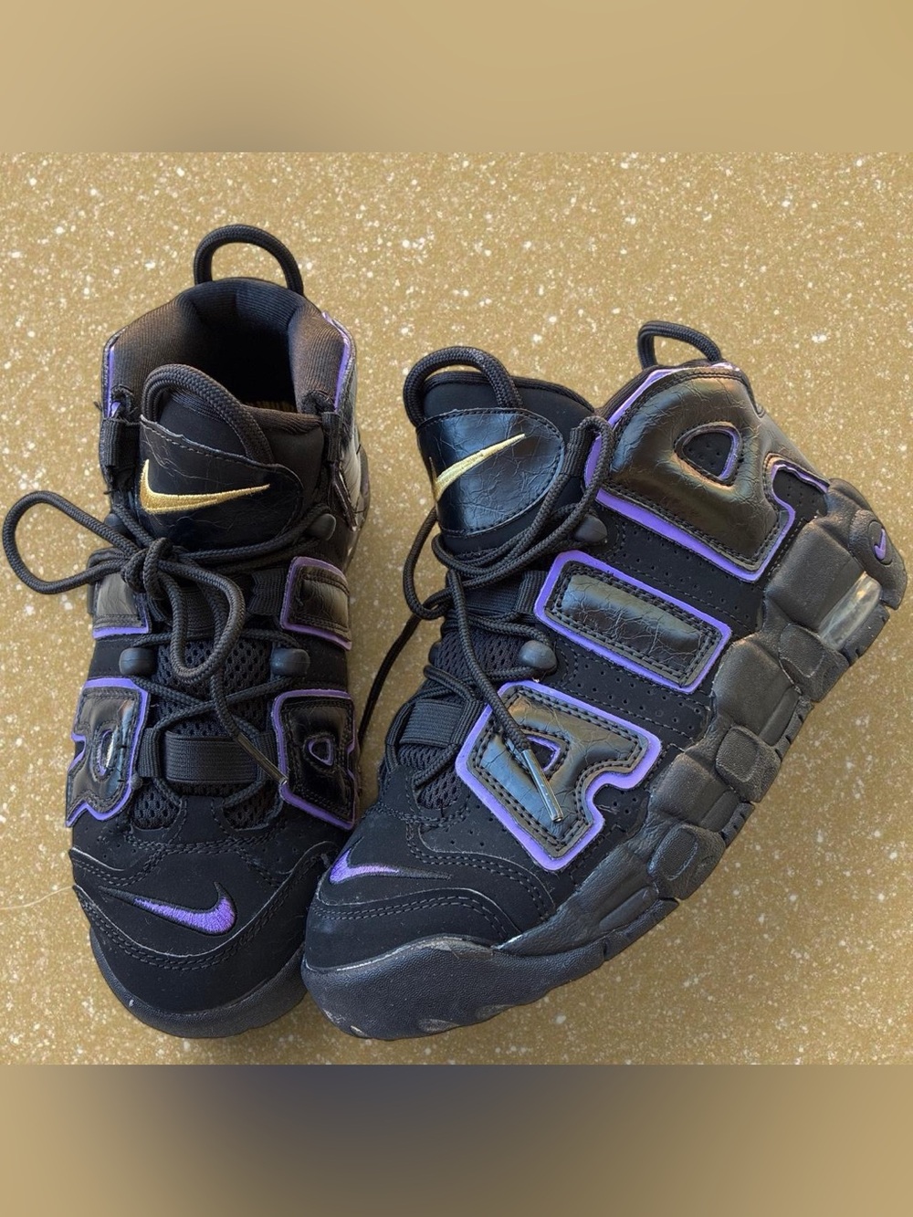 Nike Kids' Black Sneakers with Purple and Gold Accents
